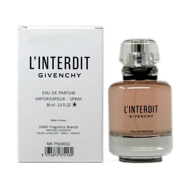 L’Interdit 80ml eau de parfum bottle in clear glass with soft pink tone and elegant black ribbon detail

