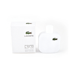 Lacoste L.12.12 Blanc 100 ml Eau de Toilette in a sleek clear bottle with a white cap and fresh-clean fragrance inside.
